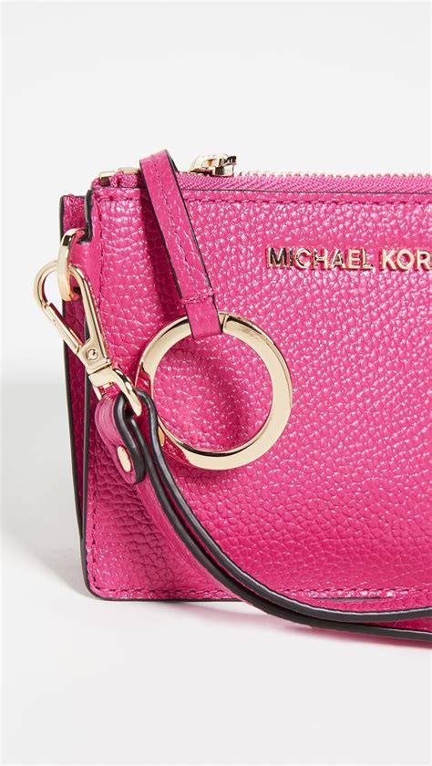 michael kors outlet pink purse.